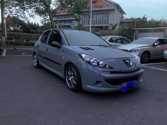 13年的二手标致207值多少钱/13年东风标致207二手车